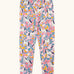 Frugi organic cotton libby leggings with a floral flight print. Pink background with all over print featuring flowers, foliage and Pegasus.