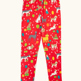 Frugi organic cotton libby leggings with a perfect paw-ty party print. Red background with all over print featuring pets with party hats surrounded by gifts and baloons.