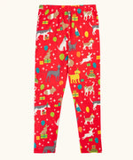Frugi organic cotton libby leggings with a perfect paw-ty party print. Red background with all over print featuring pets with party hats surrounded by gifts and baloons.