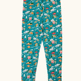 Frugi organic cotton libby leggings with a winter drives print. Teal background with all over print featuring reindeer, houses, trees and vehicles.