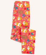 Frugi libby pink organic cotton  leggings with an all over guinea pig muddle print shown folded.