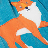 A close up of the fox applique on the Frugi Lily blue organic cotton cord children's dress.