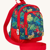 Side view of the Frugi little adventures be hoppy backpack showing the zip detail and handy red rein that's clipped to the top of the bag.