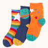 Frugi little roly bamboo socks in a 3 pack with space edesign. Rainbow stripe with white star pair, navy with planet pair and an orange with rainbow stars pair.