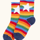 Rainbow striped roll top socks with white star from the Frugi little roly bamboo socks in a 3 pack.