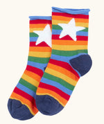 Rainbow striped roll top socks with white star from the Frugi little roly bamboo socks in a 3 pack.