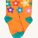 The orange flower organic cotton socks from the Frugi Little Socks fun flowers 3 pack.