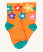 The orange flower organic cotton socks from the Frugi Little Socks fun flowers 3 pack.