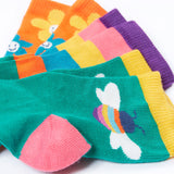 A close up of the designs on the Frugi Little Socks fun flowers 3 pack.