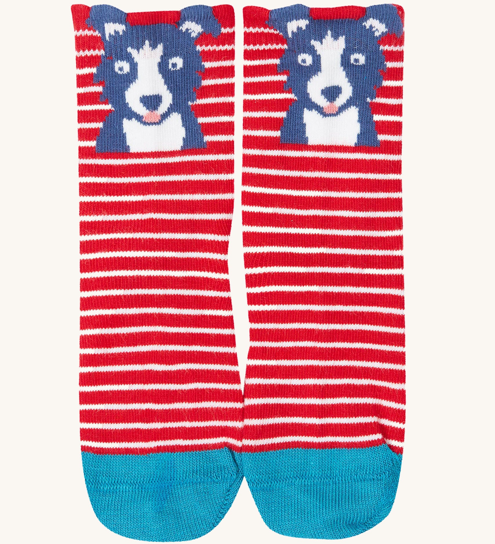 The red dog design socks from the Frugi Little Socks for baby and toddlers in a 3 pack featuring farm themed striped designs.