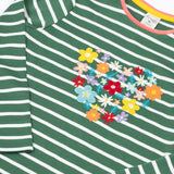 A close up of the front of the Frugi Louise embroidered heart holly green breton stripe long sleeved top.  