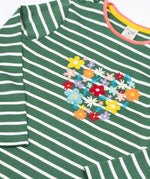 A close up of the front of the Frugi Louise embroidered heart holly green breton stripe long sleeved top.  