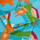 Close up of the scratch mit fold over cuffs on the Frugi lovely baby gift set featuring highland coos design on a babygrow and matching bandana dribble bib presented in a cardboard gift box.