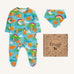 Frugi lovely baby gift set featuring highland coos design on a babygrow and matching bandana dribble bib presented in a cardboard gift box.