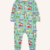 Frugi organic cotton lovely babygrow sleepsuit with an all over terrific tractors print on a blue background. 