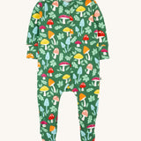 Frugi Lovely Babygrow with a fun guys design. The green coloured organic cotton babygrow has multi coloured mushrooms with happy faces.