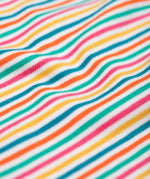 A close up of the material of the Frugi Lucia Multi Stripe Long Sleeved Organic Cotton Top. A multi-coloured, white, blue, yellow, pink and green thin striped design made with organic cotton.