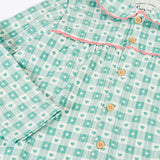Close up of the long sleeved top from the Frugi magic nights organic cotton hayley traditional pyjamas.
