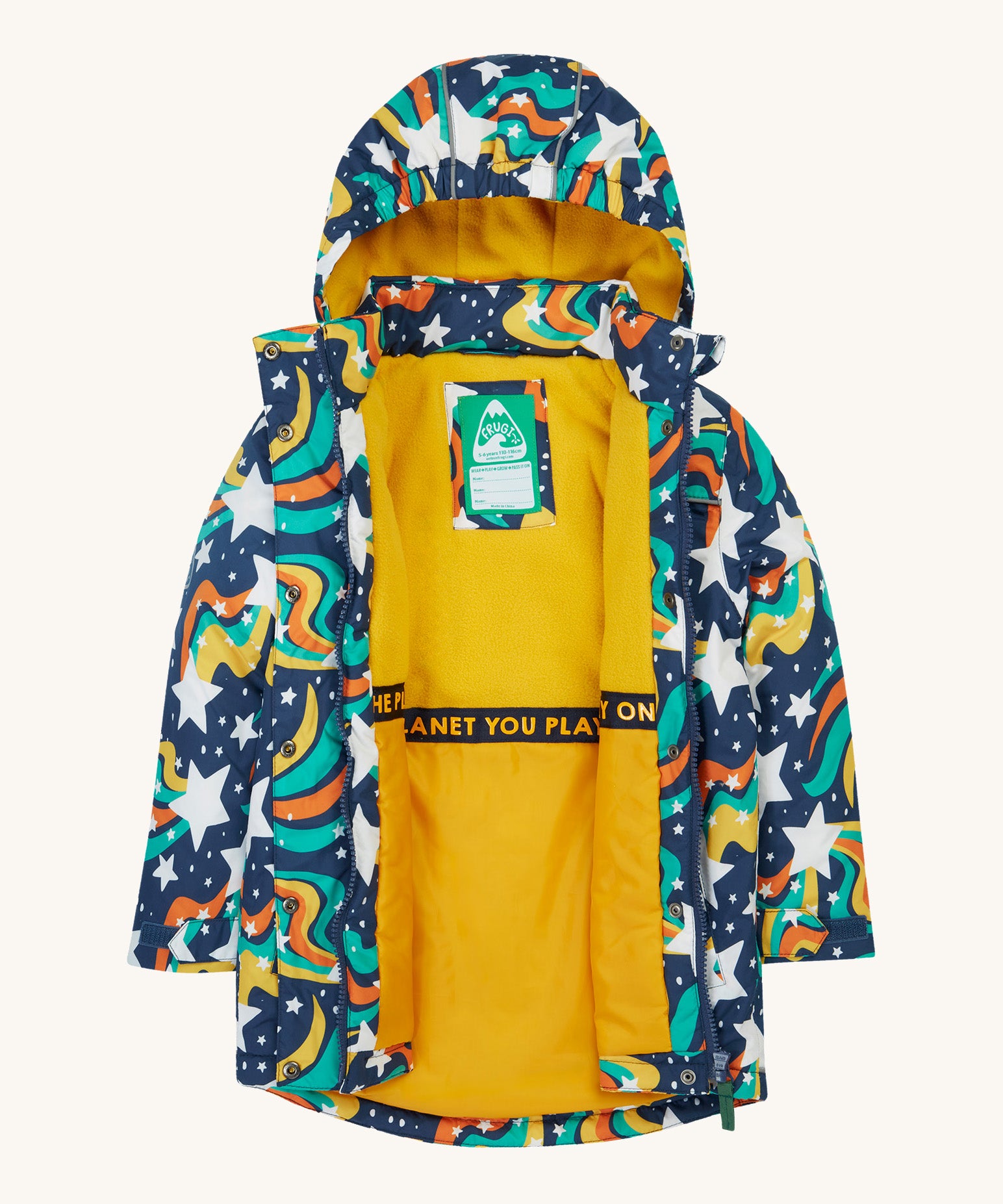 Frugi kids playtime coat in magic stars. A long length hooded coat with playful outer space inspired design and a yellow fleece inner for warmth. Features 2 side pockets, a full length zip and name tag stitched on the inside.
