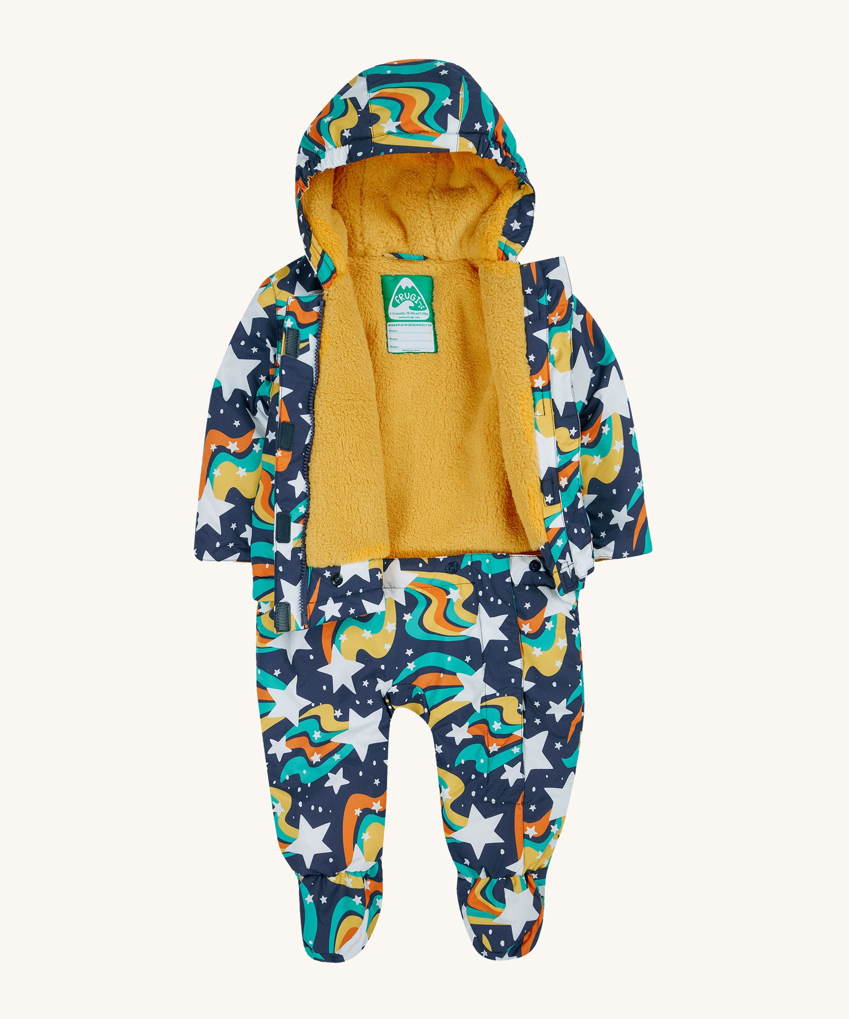 Frugi 2 in 1 rambler pram suit to coat in magic stars. A 2 in 1 outfit in a playful outer space inspired design which features popper fasteners on the trousers that can detach from the matching coat