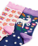 Close up of the Frugi magical organic cotton frill socks 2 pack. One navy pair with flowers and a pegasus and a purple frill. One white pair with flowers and butterflies with pink frill.
