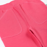 A close up of the pockets on the Frugi Malpas rose pink joggers.