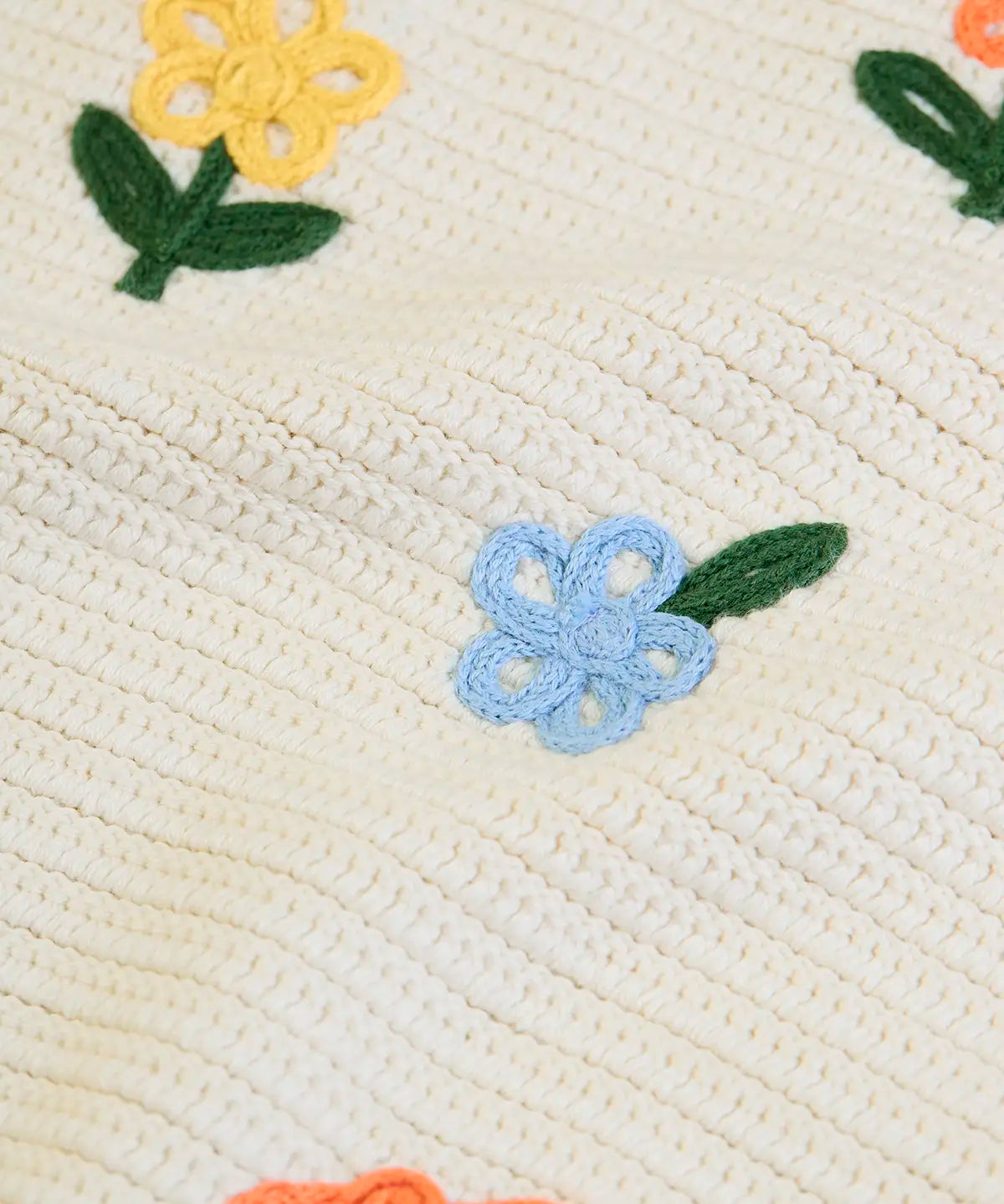Frugi GOTS 100% organic cotton natural knitted tank top in cream showing close up of the flower embroideries
