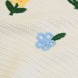Frugi GOTS 100% organic cotton natural knitted tank top in cream showing close up of the flower embroideries