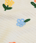 Frugi GOTS 100% organic cotton natural knitted tank top in cream showing close up of the flower embroideries