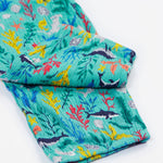 Frugi Maris Playsuit, featuring a Sea Life, close up of the folded playsuit legs.