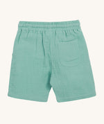 Frugi Mateo Shorts backward laid flat, in the colour Moss, featuring a back pocket.