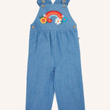 Frugi mia denim dungaree with ruffle shoulders and rainbow applique design on the front. 