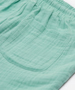 A close up of Frugi Mateo Shorts' back pocket.