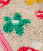 A close up of thick fleece detail on the Frugi mushroom field ted stripe fleece 