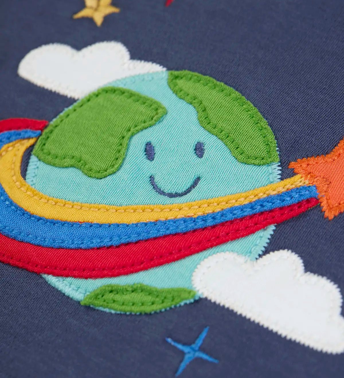 Frugi GOTS 100% organic cotton navy long sleeve top showing a close up of the cute planet earth applique