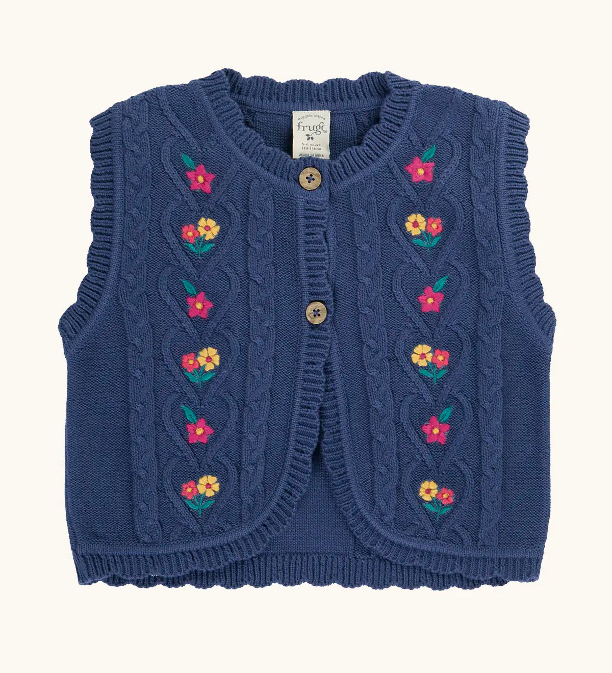 Frugi organic cotton connie navy knitted waistcoat with embroidered flower details, wooden button cluse and scalloped edges.