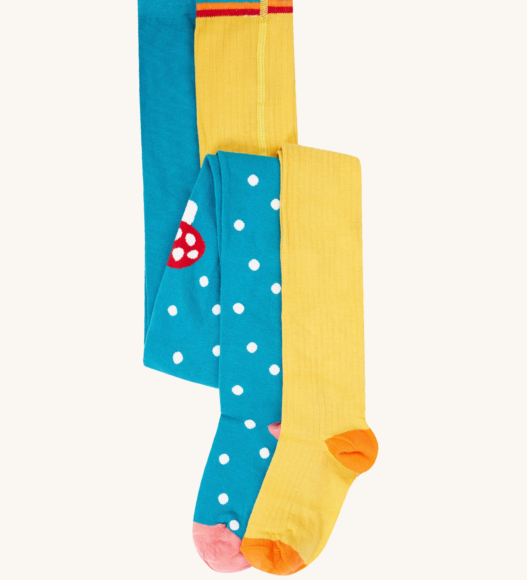 Frugi Norah 2 pack children's footed tights with bumblebee yellow and mushroom designs. The tights coordinate with other items from Frugi's Autumn Winter range available at Babipur. 