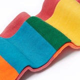 A close up of the material of the  Frugi Norah hotchpotch rose pink tights. The tights are made with skin-friendly organic cotton. 