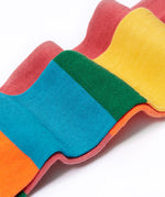 A close up of the material of the  Frugi Norah hotchpotch rose pink tights. The tights are made with skin-friendly organic cotton. 