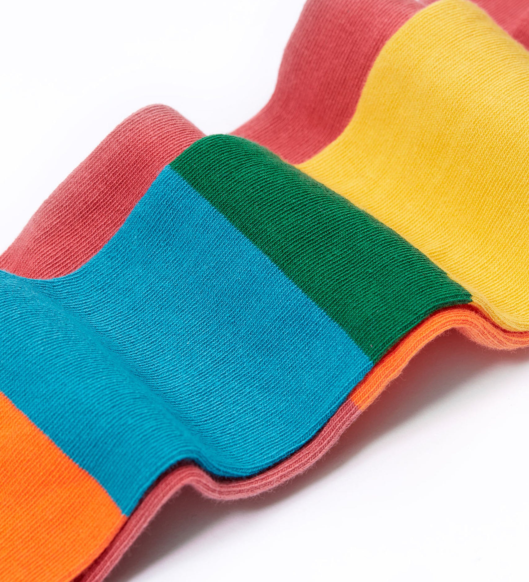A close up of the material of the  Frugi Norah hotchpotch rose pink tights. The tights are made with skin-friendly organic cotton. 