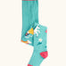 Frugi children's Norah organic cotton knitted tights in moss green with unicorns.