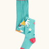 Frugi children's Norah organic cotton knitted tights in moss green with unicorns.