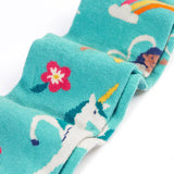 Close up of the Frugi children's Norah organic cotton knitted tights in moss green with unicorns.