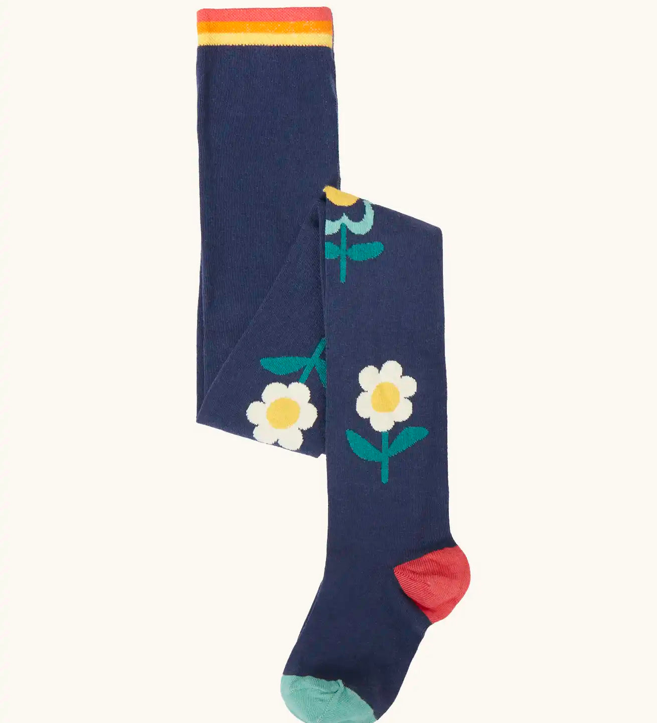 Frugi children's Norah organic cotton knitted tights in navy blue with flowers.
