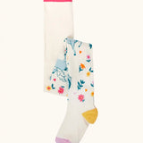 Frugi children's Norah organic cotton knitted tights in white with pegasus and flowers patterns.