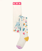 Frugi children's Norah organic cotton knitted tights in white with pegasus and flowers patterns.