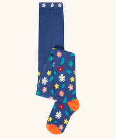 The Frugi Norah footed tights with a navy blue, flowers print design. 