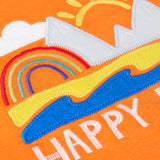 Frugi  t-shirt showing a close up of the beach applique and happy days slogan on orange fabric