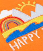 Frugi  t-shirt showing a close up of the beach applique and happy days slogan on orange fabric
