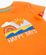 Frugi GOTS organic cotton short sleeve t-shirt in orange laid flat showing a beach applique and happy days slogan on the chest and ribbed collar